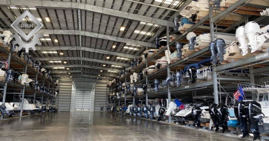 Custom marine rack system and boat hoist frame storing boats efficiently at a Gulf Coast marina