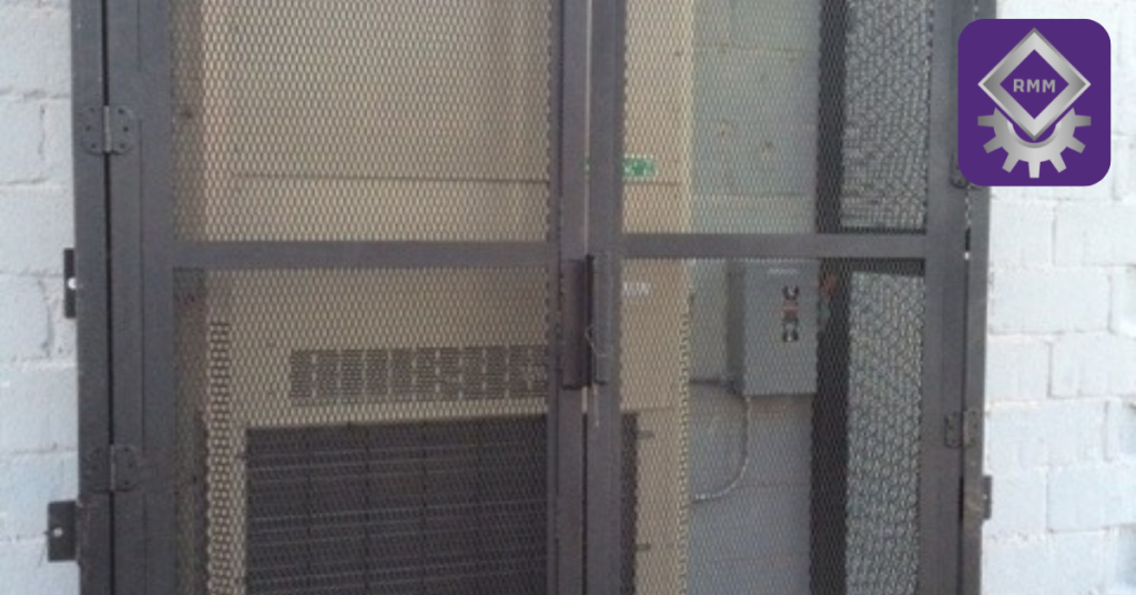 Outdoor air conditioner unit secured in a heavy-duty metal security cage